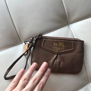 Coach bronze wristlet